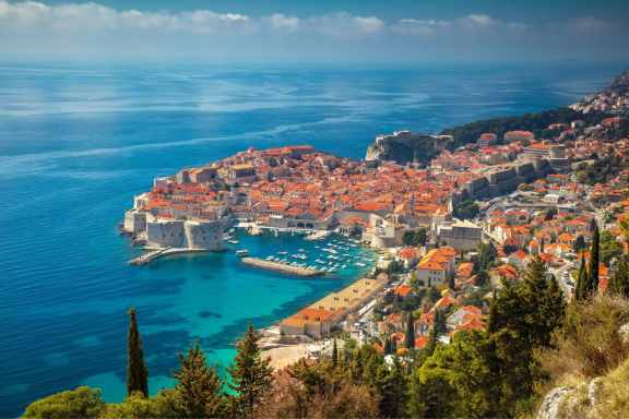 View over the harbour of Dubrovnik, Croatia. Ancient town with red roofs.