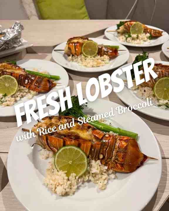 Fresh Lobster with rice and steamed broccoli