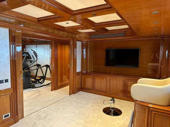 A Spa area with massage table opposite the gym, is situated between the Main Salon and the Master Suite