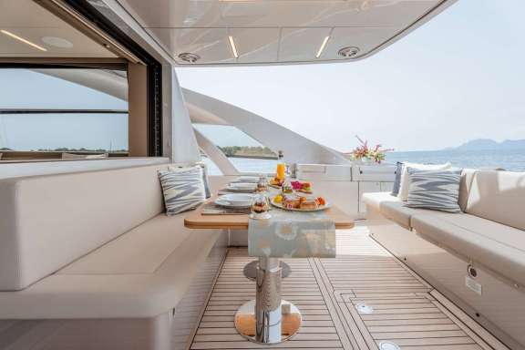 Aft-deck dining table (1 of 3 dining options onboard)